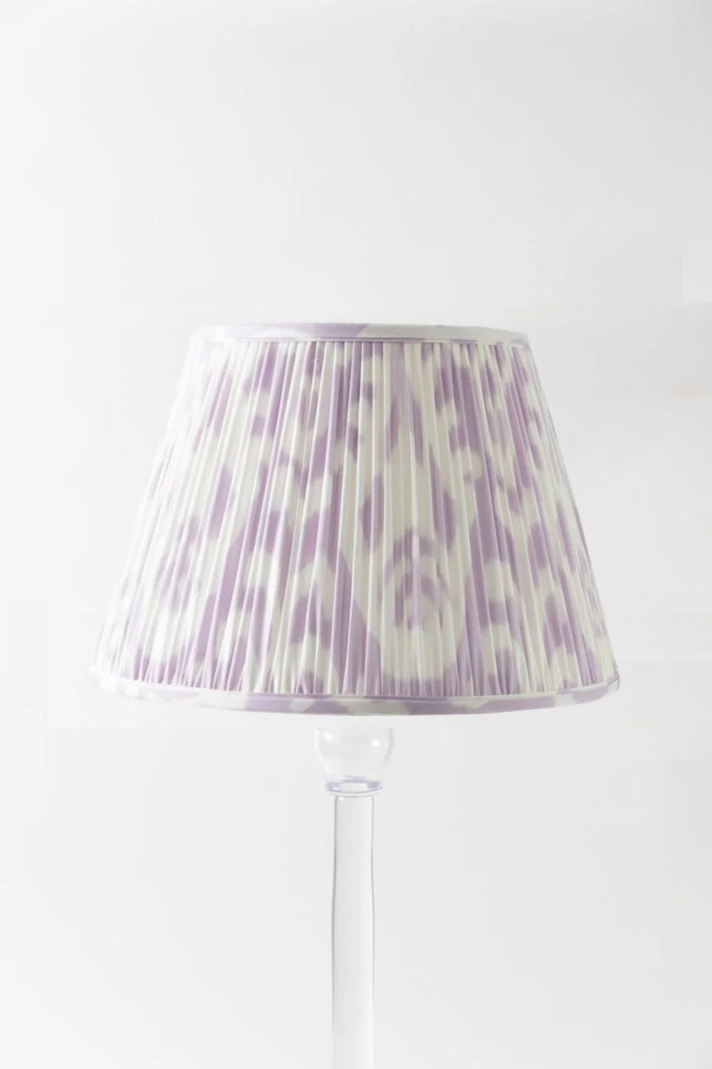 Sorella Glenn Soft Lavender Ikat empire lampshade styled on an acrylic table lamp