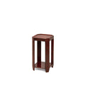 Felix Drinks Table in Brown Tortoiseshell with a glossy red-brown lacquer finish, raised-edge square top, open geometric frame, and lower shelf.