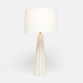 Aurelia white concrete table lamp with scallop detail and gold leaf accents. Styled with a white linen drum, available in Nashville, Tennessee