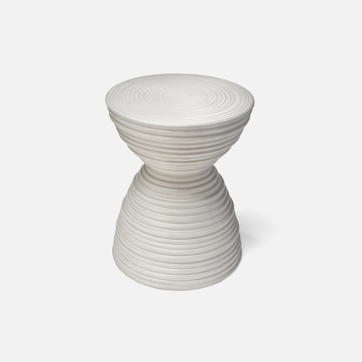 White sculptural garden stool with hourglass silhouette