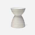 White sculptural garden stool with hourglass silhouette