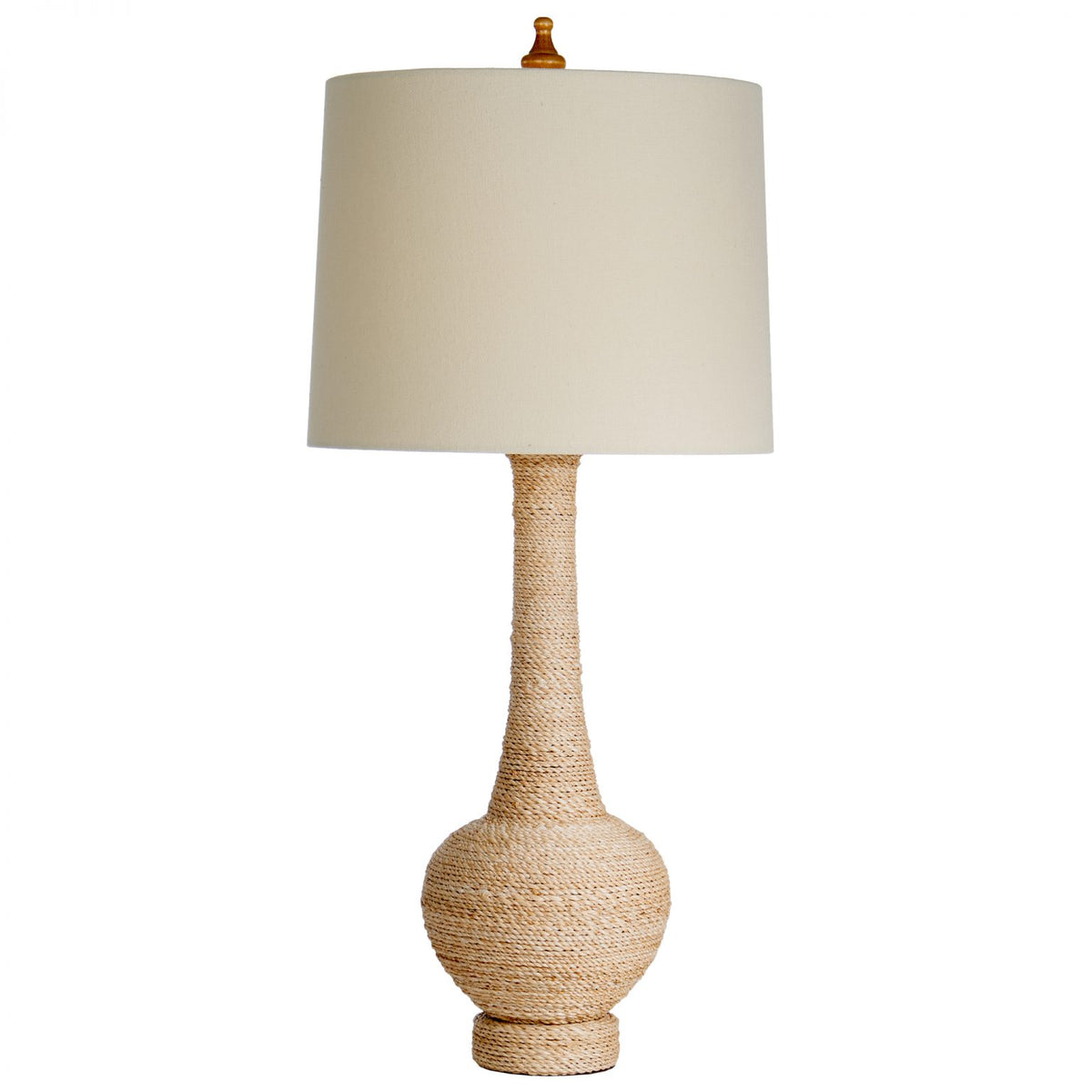 Woven rattan table lamp with a natural colored linen drum lampshade